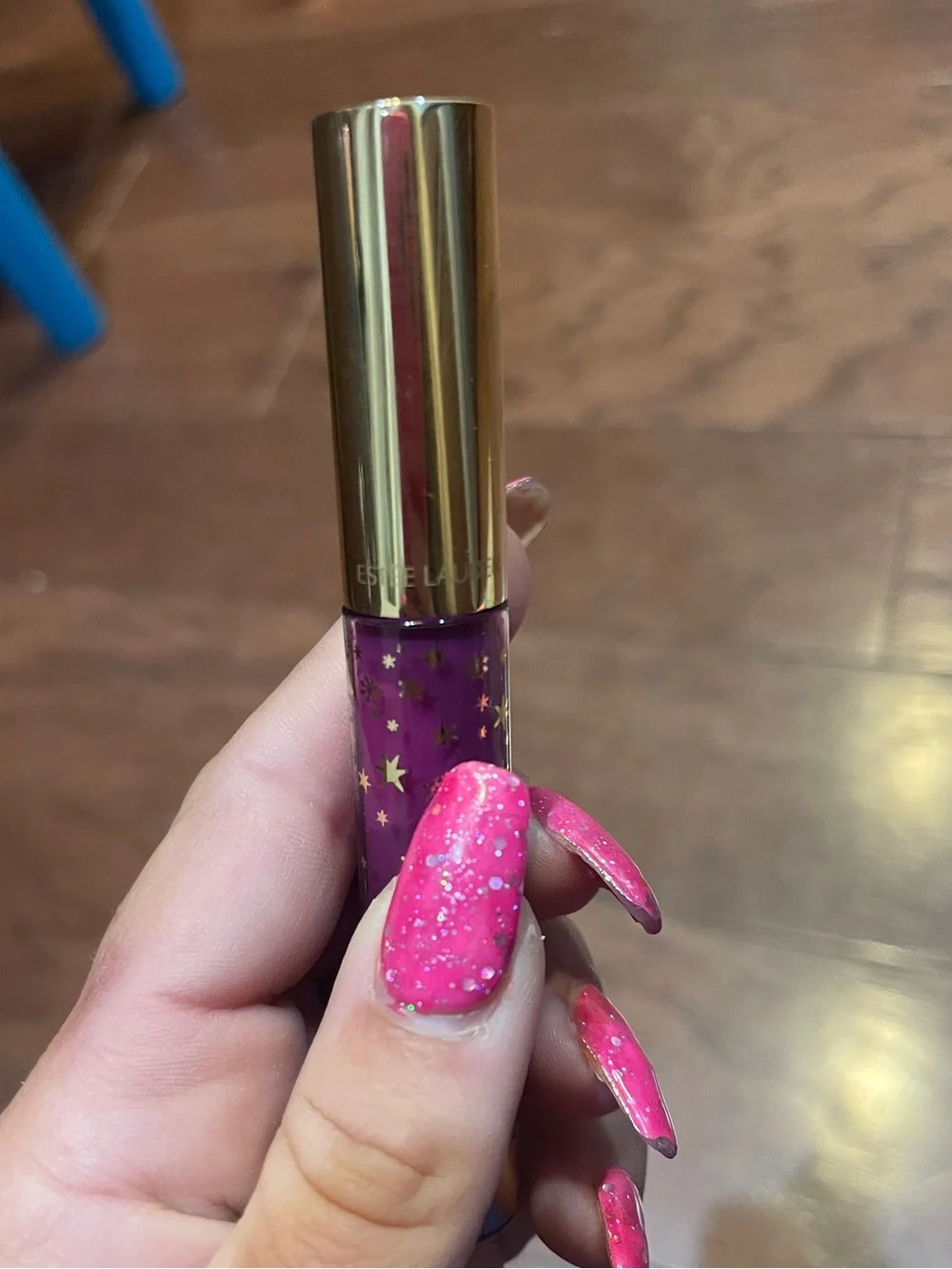 Estee Lauder Pure Color Envy Liquid Lipstick in Posh Plum with Black Cap